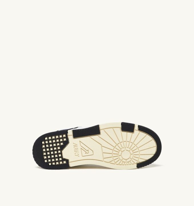 CLC Low Sneaker aus weißem Leder und schwarzem Wildleder