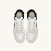 CLC Low Sneaker aus weißem Leder und schwarzem Wildleder