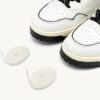 GOLF LOW SNEAKER AUS WEISSEM UND SCHWARZEM LEDER