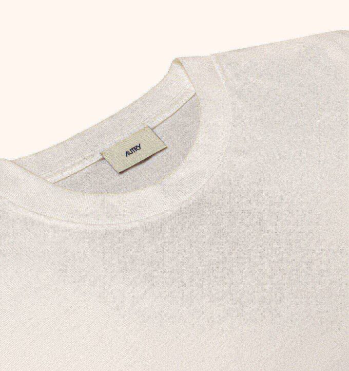 UNISEX-T-SHIRT MIT FLAGGEN-TASCHE UNISEX-T-SHIRT MIT FLAGGEN-TASCHE